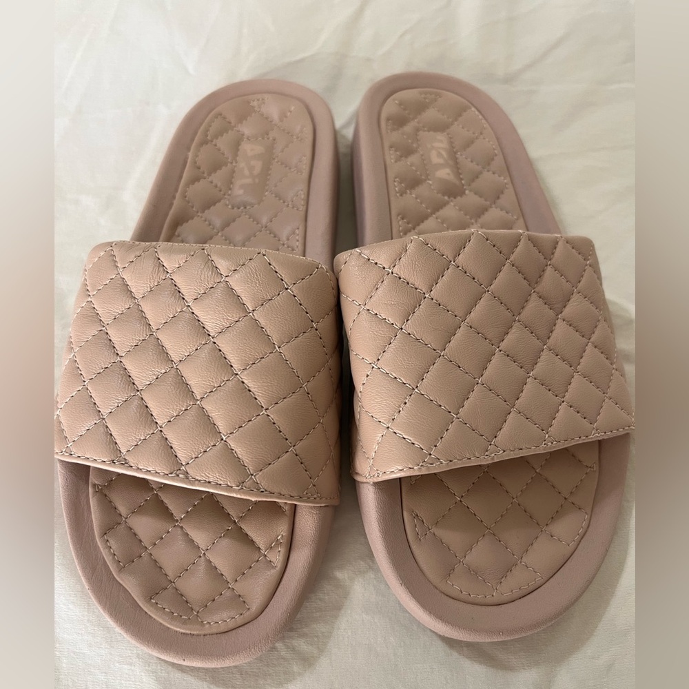 APL slides. Light mauve in color.